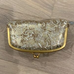 Hobo frame pouch with mirror.